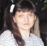 Любовь Захарченко, т.е. я, как это не странно... Фотография сделана журналистом Галиной Гончаровой на Грушинском фестивале авторской песни 2001г. Спасибо ей большое!
